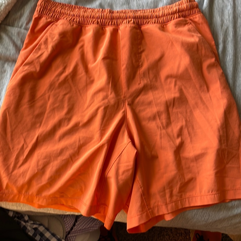 Lululemon Mens Pace Breaker 7in inseam short. Orange. Size medium